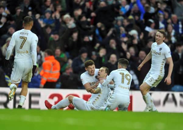 FALSE HOPE: Leeds United celebrate Pierre-Michel Lasogga's second strike which put the Whites 3-2 up. Picture by Tony Johnson.