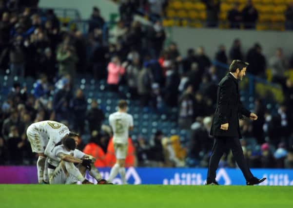 Thomas Christiansen trudges off the pitch at full time.