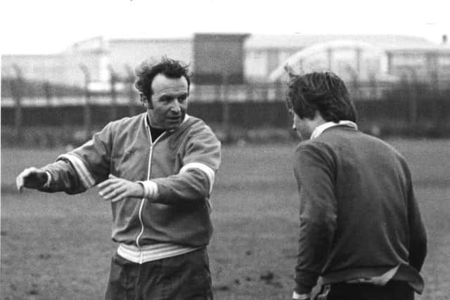 " Former Blackpool hero Jimmy Armfield who hws been helping out with coaching at Blackpool since losing his manager's job at Leeds, gives goalkeeper iain Hesford a few tips in a session at Squires Gate today." Dated 18/01/1979.
Published EG 17/01/1979