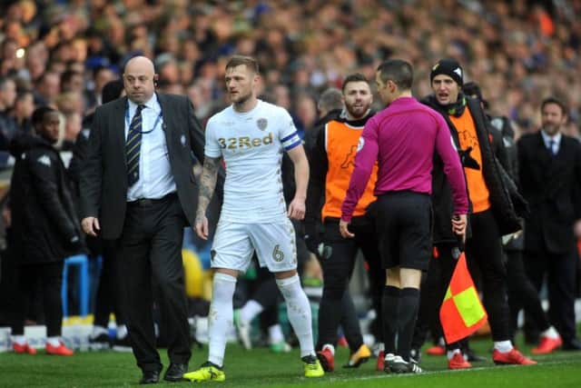 Leeds United captain Liam Cooper is sent off against Millwall.
