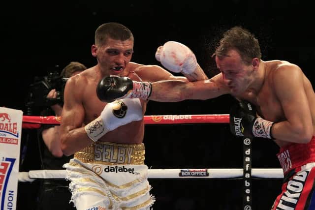 Defending champion Lee Selby, left.