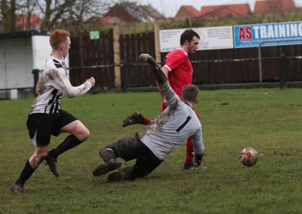 Rob Youhill scores in Knaresborough Town's 4-1 victory at East Yorkshire Carnegie.