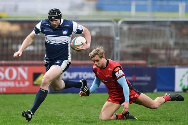 Yorkshire Carnegie's Stevie McColl strides away to score the match-winning try against Hartpury. PIC: Jonathan Gawthorpe