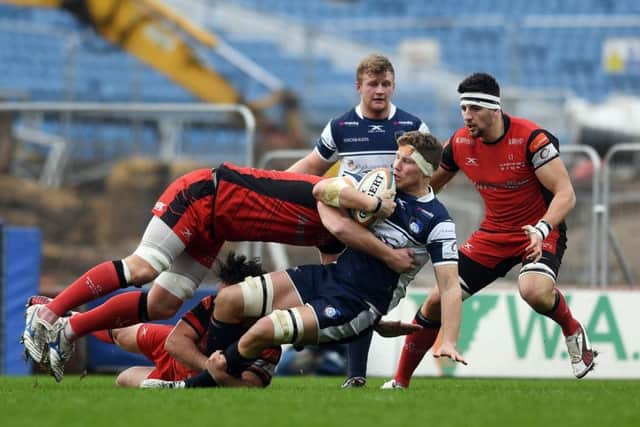 Yorkshire Carnegie's form forward, Richard Beck, is knocked back. PIC: Jonathan Gawthorpe