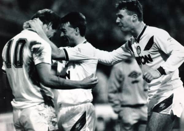 OCTOBER 1987: John Sheridan and Glynn Snodin congratulate goalscorer Peter Swan.