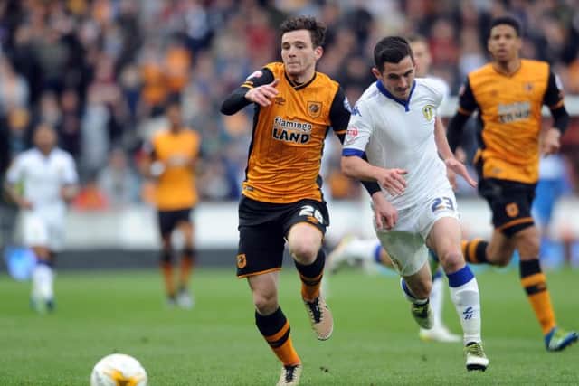Leeds United's Lewis Cook is challenged by Hull's Andy Robertson back when the two sides met at the KCOM in April 2016. Picture: Simon Hulme