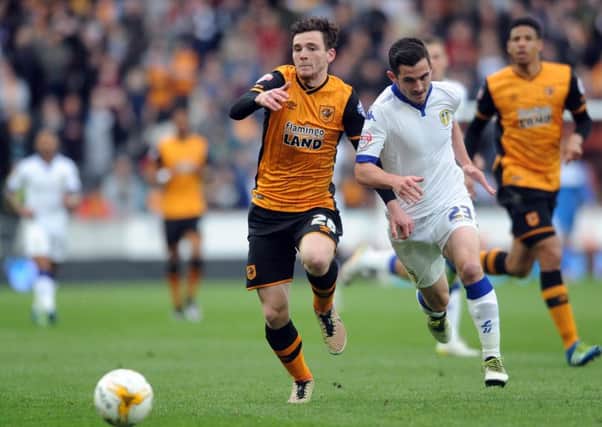 Leeds United's Lewis Cook is challenged by Hull's Andy Robertson back when the two sides met at the KCOM in April 2016. Picture: Simon Hulme