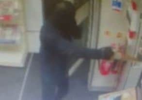 Police have released CCTV images from the raid.