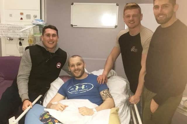 UFC fighter Darren Till, Josh Millson and Stuart West visiting Jason Pepper in hospital.