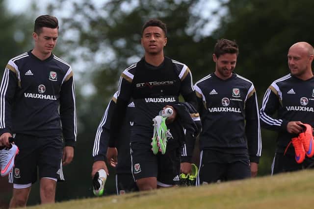 Tyler Roberts, centre, with Wales' squad.