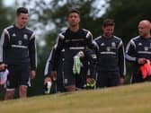 Tyler Roberts, centre, with Wales' squad.