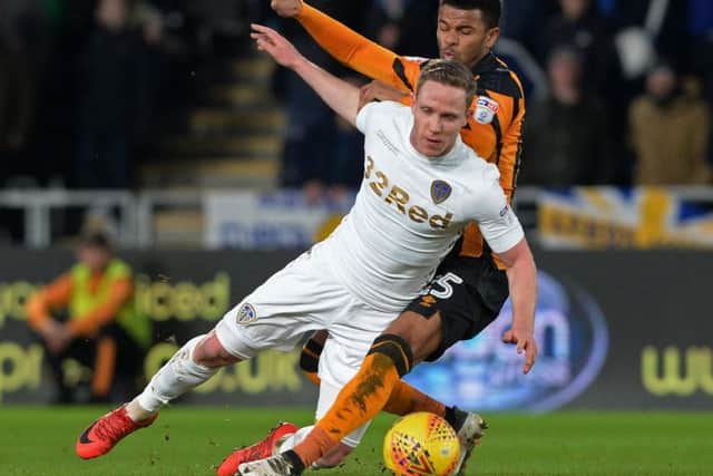 WHITES DEBUT: Leeds United's Adam Forshaw and Hull City's Fraizer Cambell challenge for the ball. Picture by Bruce Rollinson.