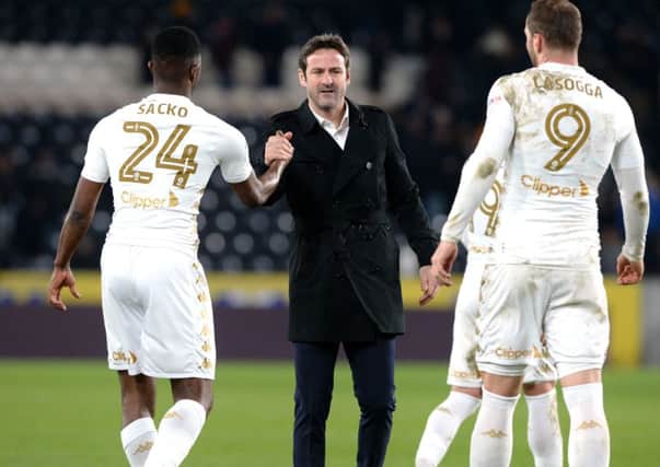 GOALLESS: Leeds United head coach Thomas Christiansen with Hadi Sacko and Pierre-Michel Lasogga at the full-time whistle. Picture by Bruce Rollinson.