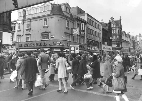 DECEMBER 1971: A pedestrian crossing on Briggate.