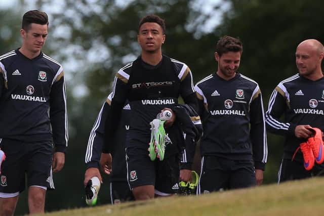 Tyler Roberts, centre, with Wales' squad.