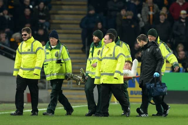 Conor Shaughnessy was stretchered off at Hull City on Tuesday evening, adding to Leeds United's defensive woes. PIC: Bruce Rollinson
