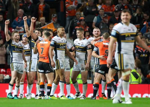 Leeds players celebrate their Grand Final win over Castleford Tigers at Old Trafford last year. Picture: Alex Whitehead/SWpix.com