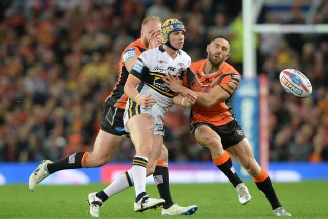 Jack Walker releases the ball as Luke Gale challenges in last year's Grand Final at Old Trafford.  Picture: Bruce Rollinson