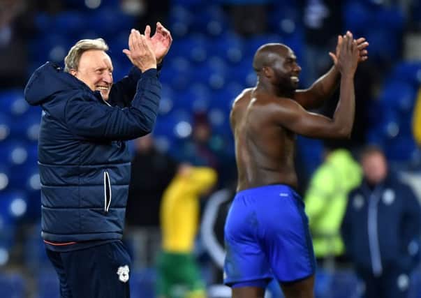 Cardiff City manager Neil Warnock (left) and Sol Bamba.