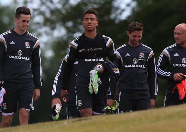 Tyler Roberts, centre, with Wales' squad.