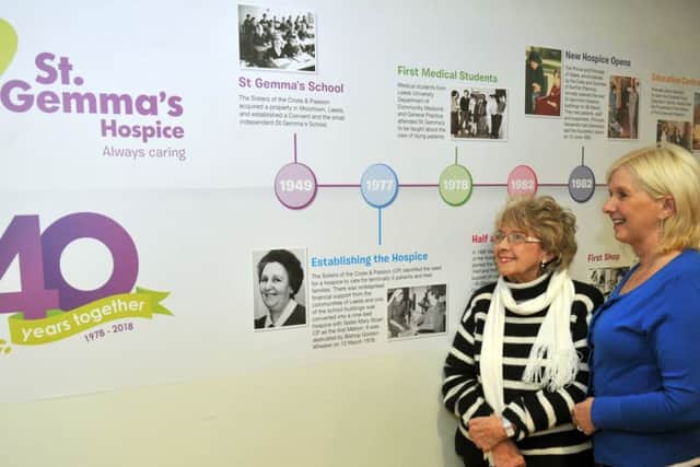 010218   Agnes  Bligh (left)  and her daughter  Helen Baldwin alongside the timeline of St Gemmas Hospice   in the bistro at the hospice.