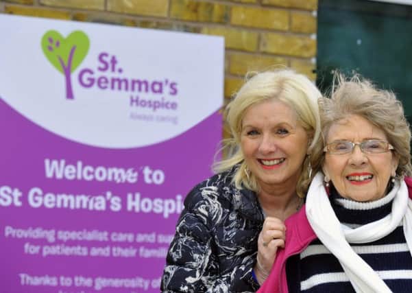 Agnes Bligh (right) and her daughter  Helen Baldwin  the  relatives of  Terry Bligh the first ever patient at  St Gemmas Hospice , outside the  hospice  in Leeds.