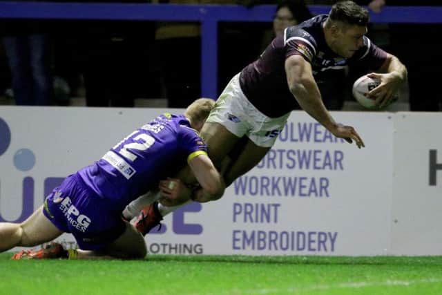 Ryan Hall dives over to score at Warrington.
