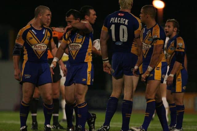 Leeds players show their dejection during the Engage Super Leauge play-off at Headingley Stadium. PIC: Nigel Roddis/PA