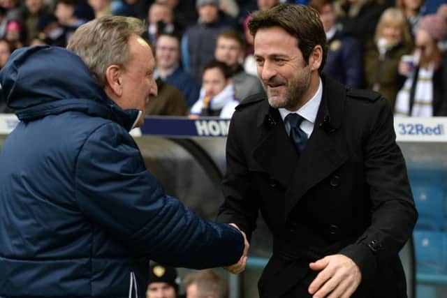 Thomas Christiansen greets former Leeds United boss Neil Warnock at Elland Road on Saturday.  Picture: Bruce Rollinson