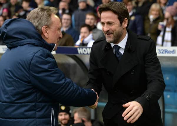 Thomas Christiansen greets former Leeds United boss Neil Warnock at Elland Road on Saturday.  Picture: Bruce Rollinson
