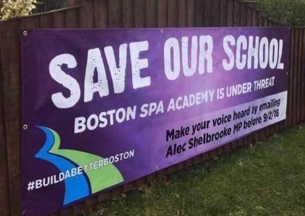 CAMPAIGN: Save Our School banners have been put up.