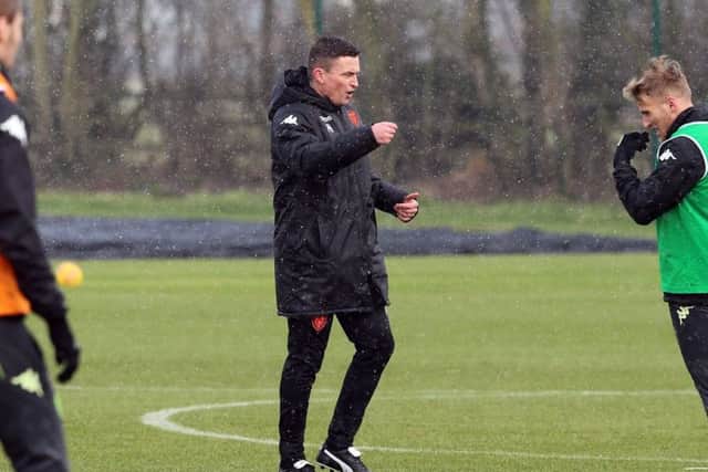 LEADING THE WAY: Paul Heckingbottom at Thorp Arch with his Leeds United squad. Picture: Varleys/LUFC.