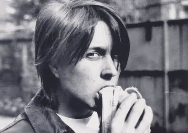 Sarah Lucas's, Eating a Banana (1990), from Self-Portraits 1990-98. Arts Council Collection, Southbank Centre, London Â© the artist 2018.
