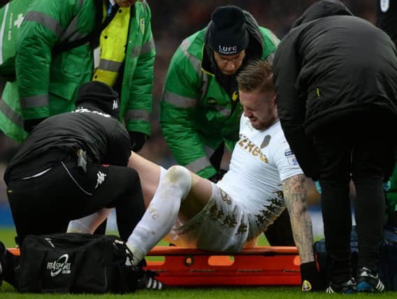 Pontus Jansson is stretchered out of Saturday's defeat to Cardiff City.