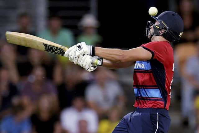 England's Dawid Malan misses a pull shot on his way to a top score of 50 during England's T20 defeat  in Hobart. Picture: Tracey Nearmy/AAP Image via AP.