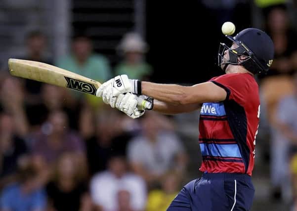 England's Dawid Malan misses a pull shot on his way to a top score of 50 during England's T20 defeat  in Hobart. Picture: Tracey Nearmy/AAP Image via AP.