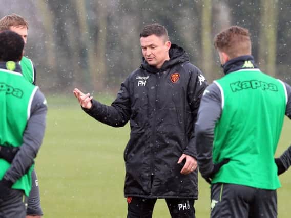 Paul Heckingbottom, seen above with his players on Tuesday, met the media for the first time as Leeds United head coach. Picture: Varleys/LUFC