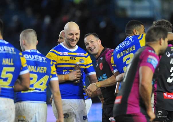 Rhinos' Carl Ablett is all smiles with former team-mate Danny McGuire.
