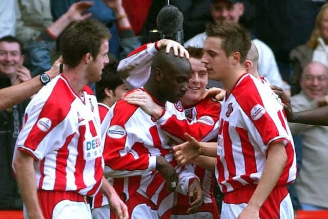 Steve Kabba of Sheffield United's Steve Kabba (centre) is congratulated  after scoring the winner against Leeds during the FA Cup Sixth round match at Bramall Lane in March 2003. PA Picture: John Giles
/PA.