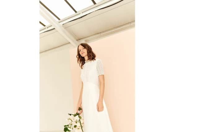 YEP WHISTLES WEDDING COMPETITIONThe new Scarlett backless micro floral lace dress with scalloped high collar and inverted pleat skirt with train, Â£649.