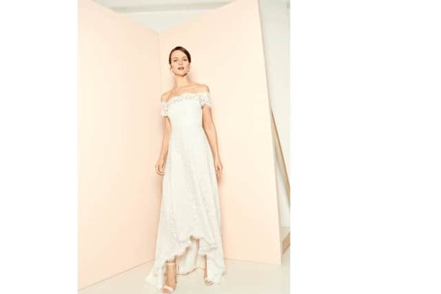 YEP WHISTLES WEDDING COMPETITIONThe Rose, with Bardot neckline, in lace with raised frony hem and bonded bodice, Â£599.