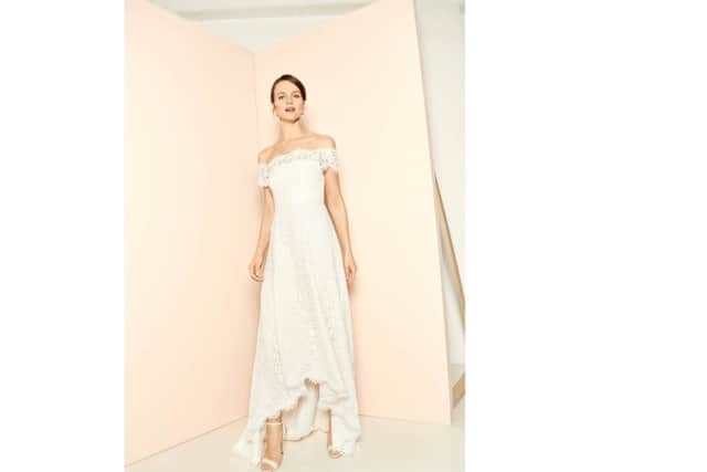 YEP WHISTLES WEDDING COMPETITION
The Rose, with Bardot neckline, in lace with raised frony hem and bonded bodice, Â£599.