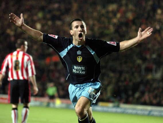 MEMORABLE: Liam Miller celebrates his winning goal against Southampton in November 2005.