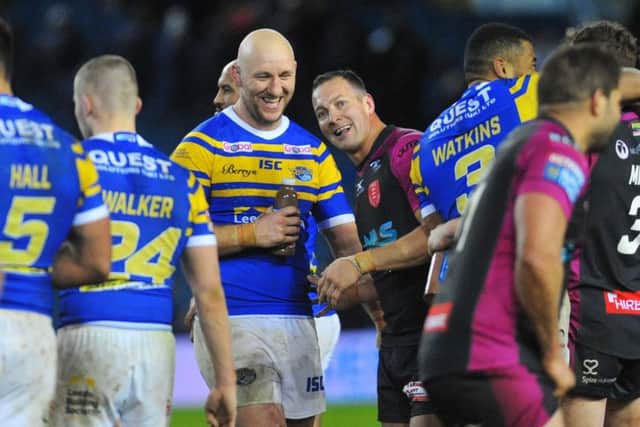 Danny McGuire and Carl Ablett share a joke after the match at Elland Road.