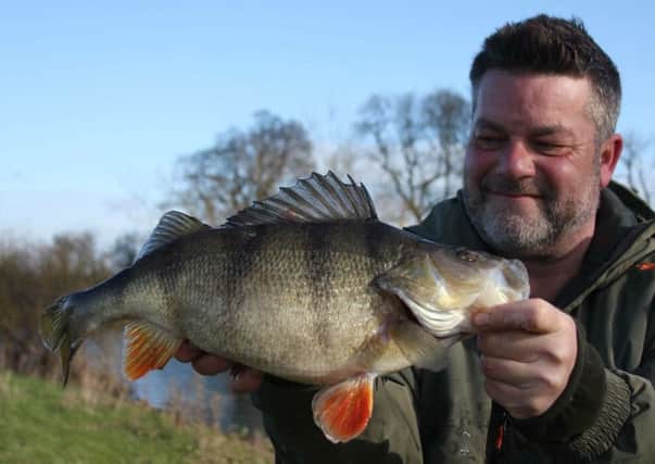 Top rod Darren Starkey with a 3-02 perch from the bungalows section on the River Ouse. PIC: Steve Fearnley
