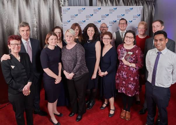 TEAM EFFORT: Staff at Leeds Teaching Hospitals were awarded for improving the care of Parkinsons patients.