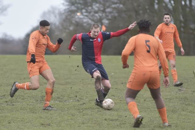 Old Batelians Reserves' Michael Smith is crowded out during Saturday's Hodgson Cup encounter at Shire III. PIC: Steve Riding