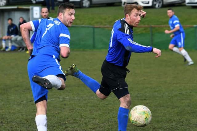 Ben Thornton (HT Sports) and Kippax's Ian Brown in Sanford Cup action. PIC: Jonathan Gawthorpe