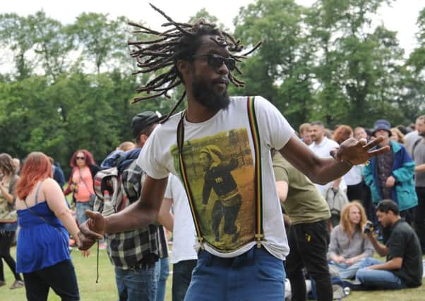 People dance to music at the Hyde Park Unity Day in 2013.