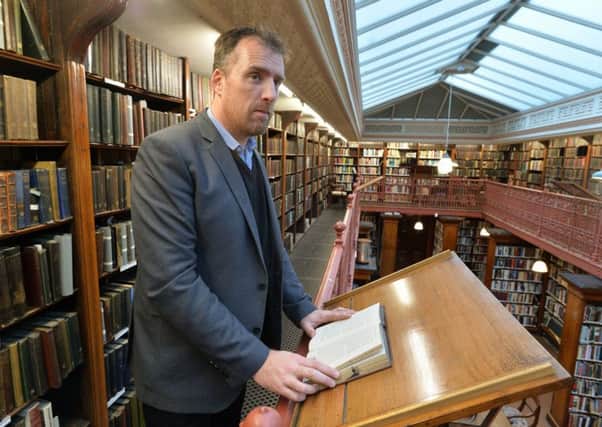 GEM:  Carl Hutton, boss of The Leeds Library, wants people to discover one of the citys cultural gems.